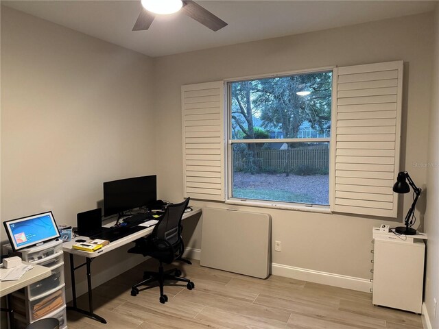 office space featuring ceiling fan