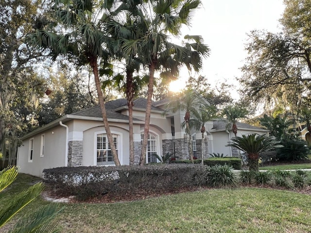 view of front of home with a front yard