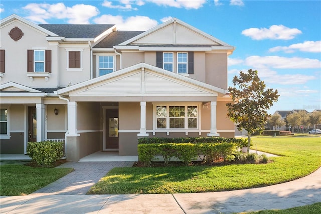 view of front of home with a front yard