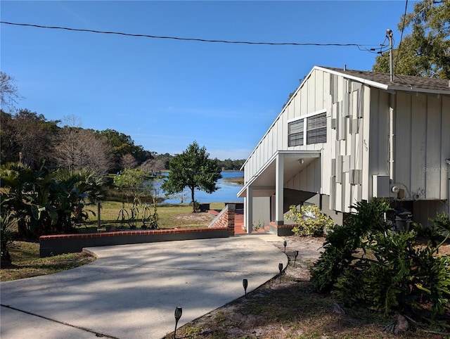 view of home's exterior with a balcony