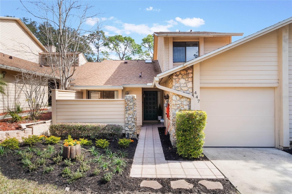 front of property with a garage