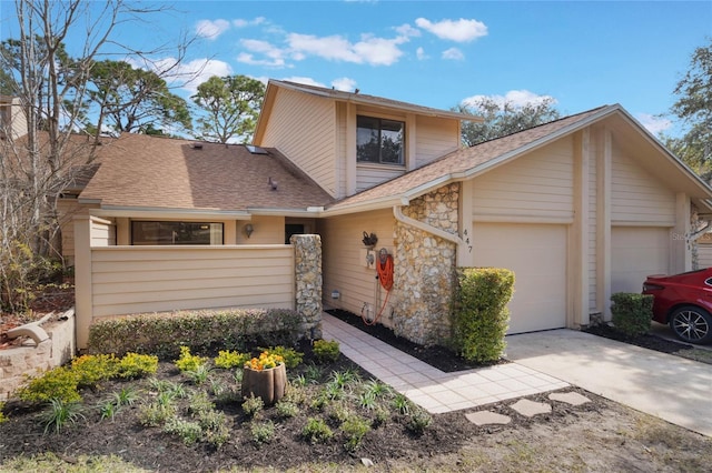 front facade with a garage