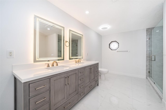 bathroom with vanity, toilet, and walk in shower