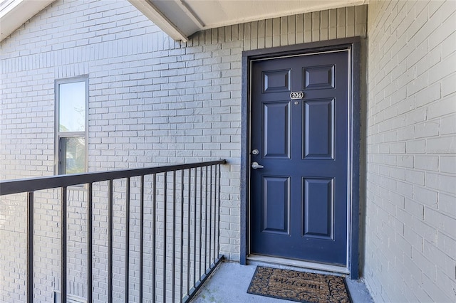 doorway to property with a balcony