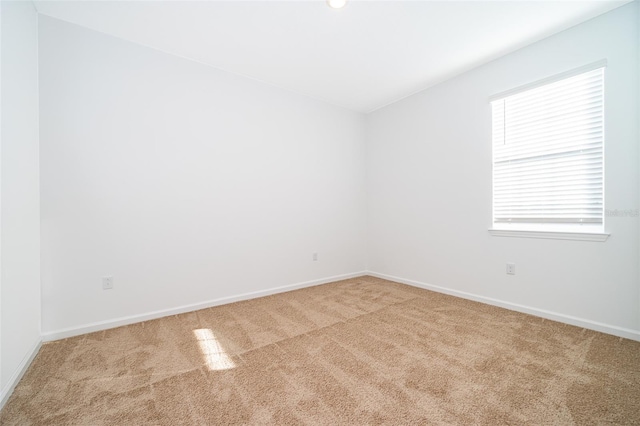 empty room with carpet flooring