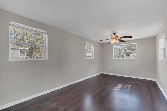 unfurnished room featuring ceiling fan and dark hardwood / wood-style flooring