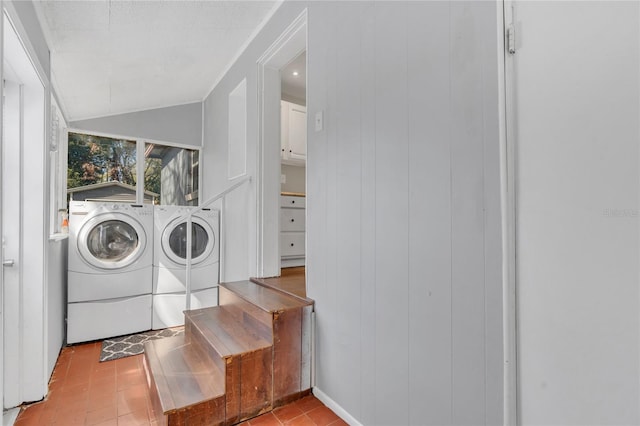 clothes washing area featuring washer and clothes dryer