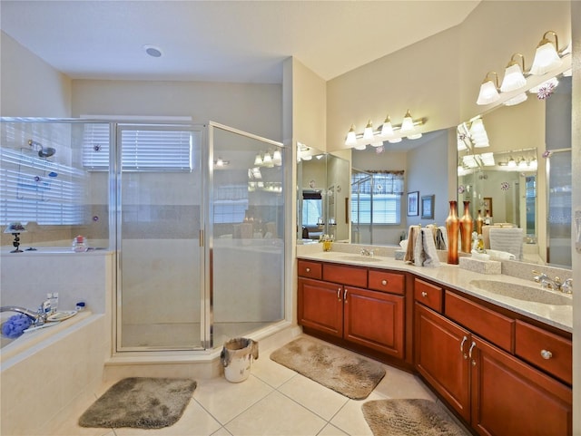 bathroom with vanity, tile patterned floors, and walk in shower