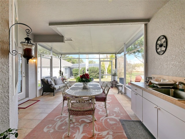 sunroom with sink