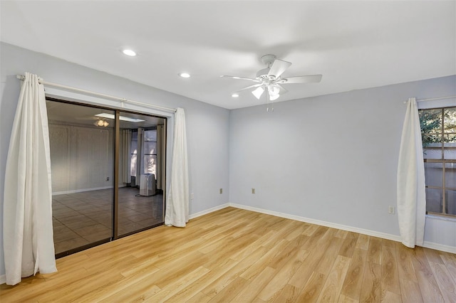 unfurnished bedroom featuring ceiling fan and light hardwood / wood-style floors