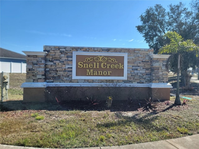 view of community sign