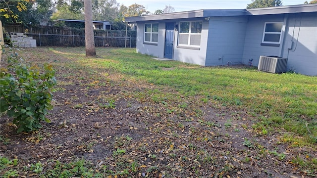 view of yard featuring central AC