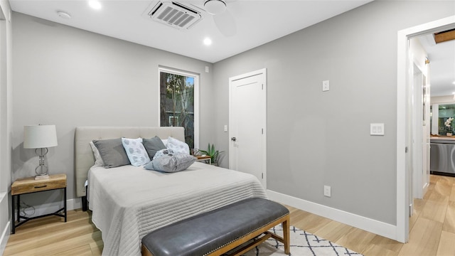 bedroom featuring ceiling fan and light wood-type flooring