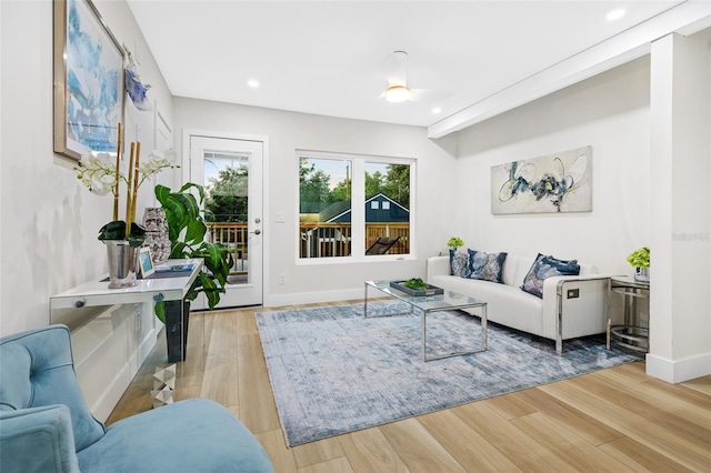 living room with light hardwood / wood-style flooring