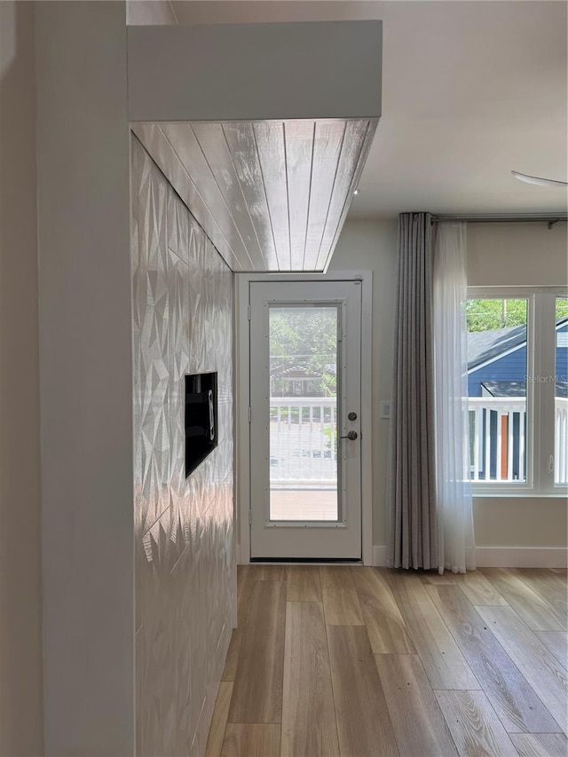 entryway featuring plenty of natural light and light wood-type flooring