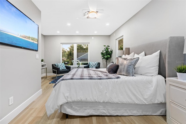 bedroom with light hardwood / wood-style floors