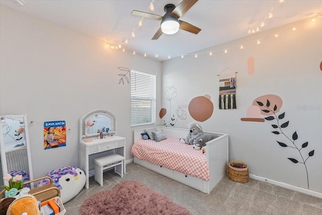 bedroom with ceiling fan and light carpet