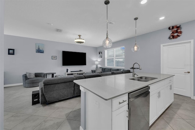 kitchen with dishwasher, an island with sink, sink, white cabinets, and hanging light fixtures