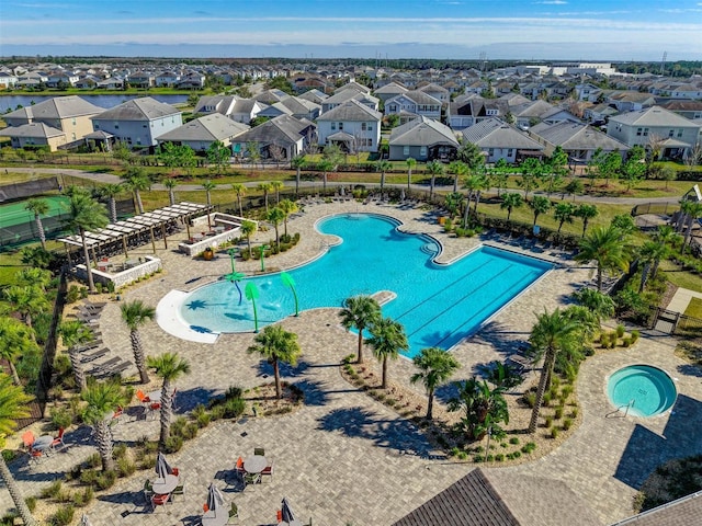 view of swimming pool with a patio