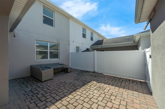 view of patio / terrace featuring fence