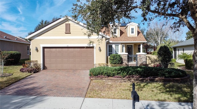 view of front of home featuring a garage