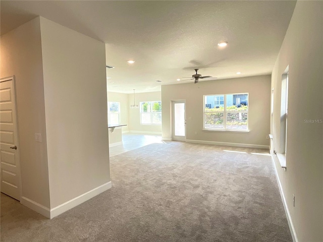 interior space featuring ceiling fan