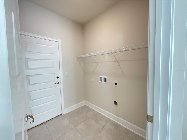 laundry room with electric dryer hookup, light tile patterned floors, and hookup for a washing machine