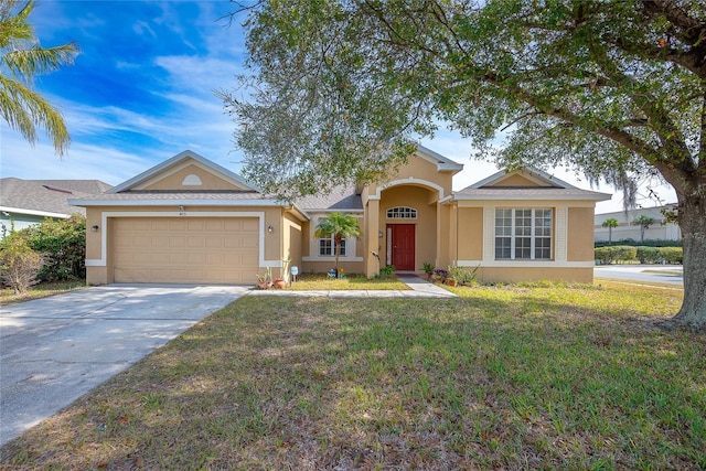 ranch-style house with a garage and a front lawn