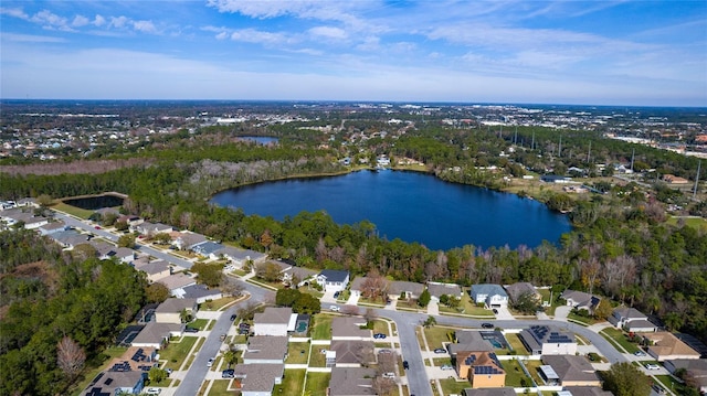 birds eye view of property featuring a water view and a residential view