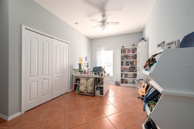 office space featuring tile patterned flooring and ceiling fan