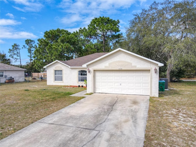 ranch-style home with a garage and a front yard