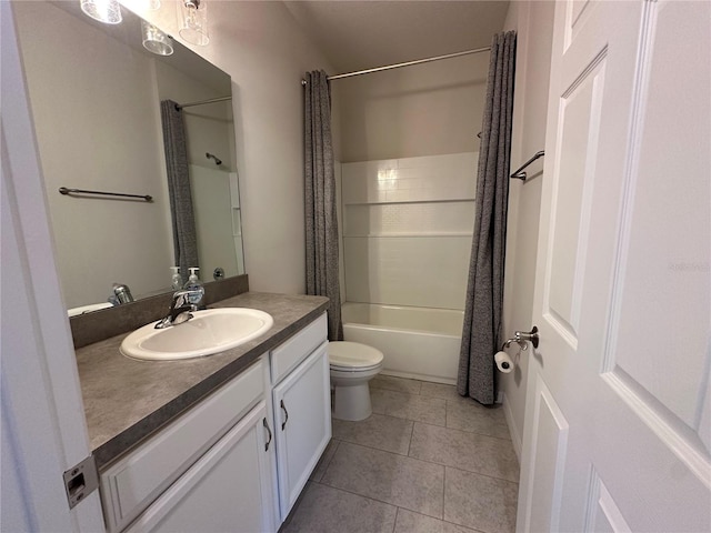 full bathroom featuring shower / tub combo with curtain, vanity, tile patterned floors, and toilet