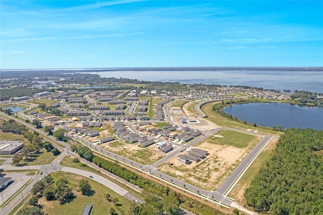 drone / aerial view featuring a water view