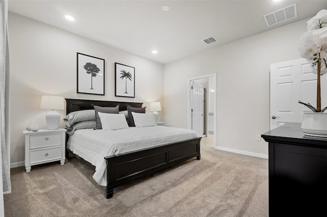 bedroom featuring light carpet, visible vents, recessed lighting, and baseboards