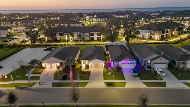 aerial view at dusk with a residential view