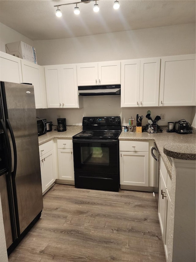 kitchen featuring black appliances, under cabinet range hood, white cabinets, and light wood finished floors