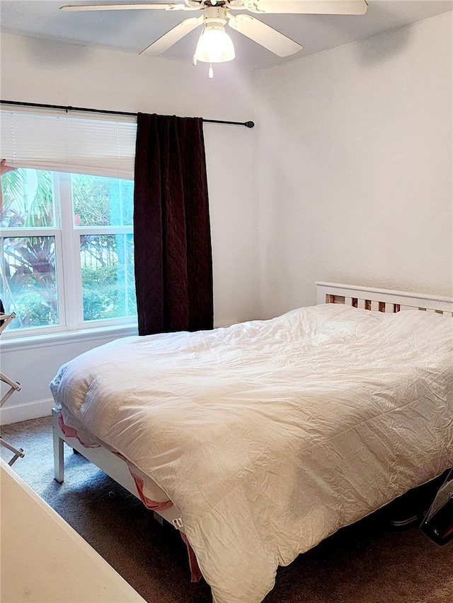 bedroom featuring carpet flooring and ceiling fan