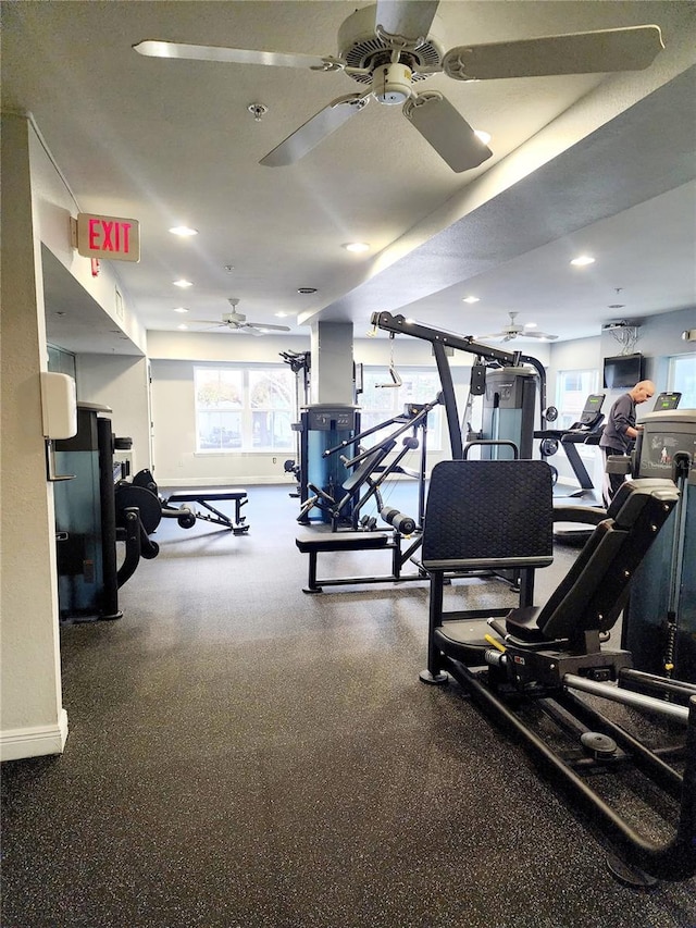 workout area featuring ceiling fan, baseboards, and recessed lighting