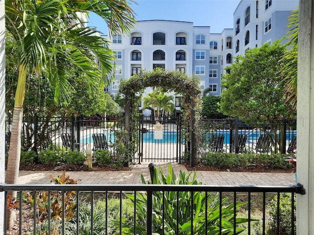 community pool featuring fence