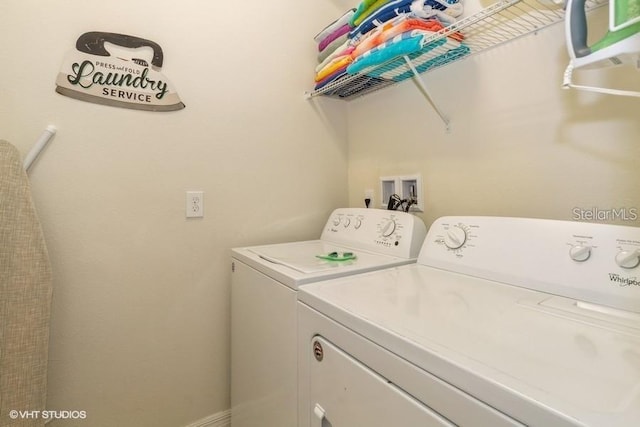 laundry area with separate washer and dryer