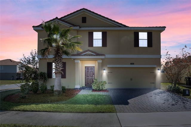 view of front of house with a garage