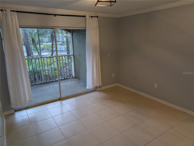 unfurnished room featuring crown molding, light tile patterned floors, and a textured ceiling