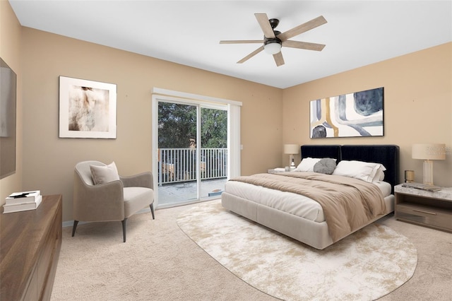 carpeted bedroom with access to outside and ceiling fan