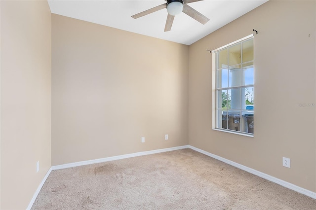 carpeted empty room with ceiling fan