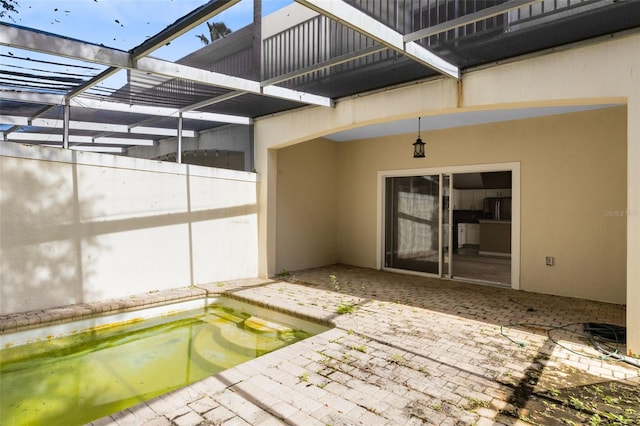 interior space with a jacuzzi and glass enclosure