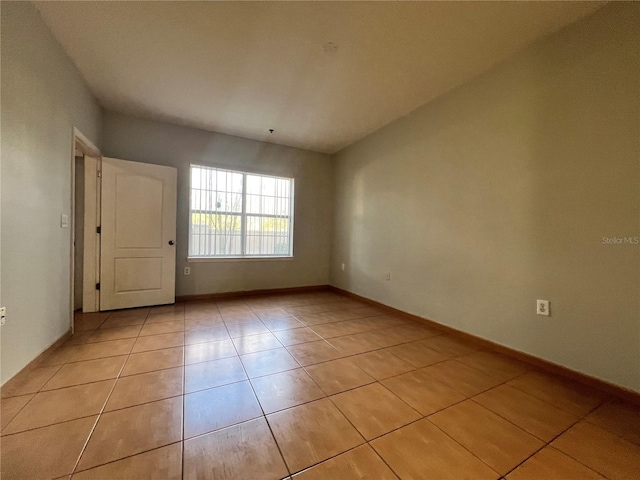 view of tiled spare room