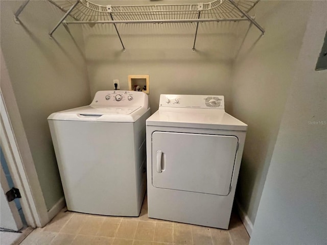 laundry area featuring separate washer and dryer