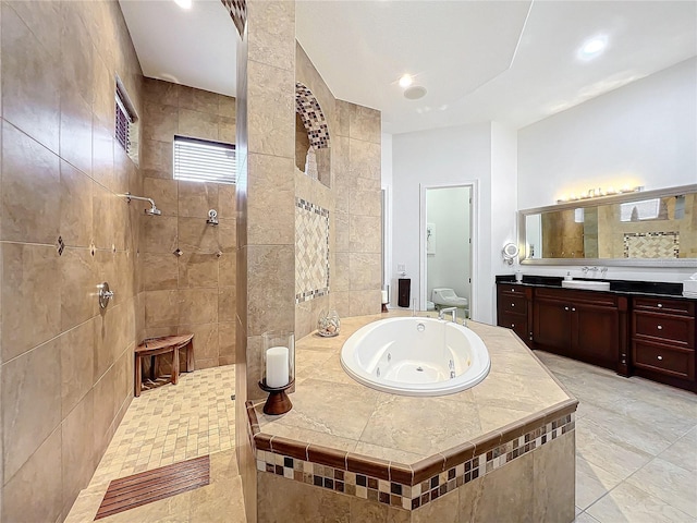 full bathroom with vanity, tile patterned floors, independent shower and bath, and toilet