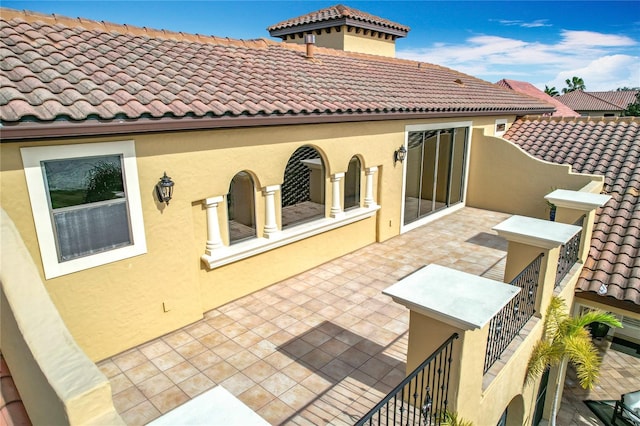 rear view of house featuring a patio area