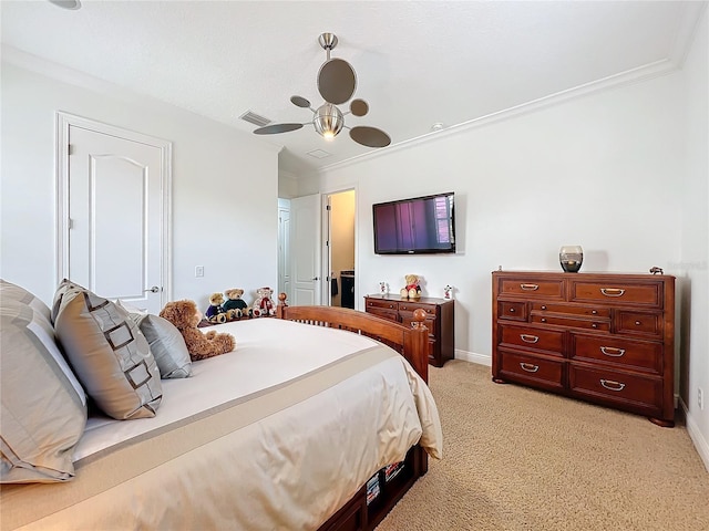 bedroom featuring crown molding, light colored carpet, and ceiling fan